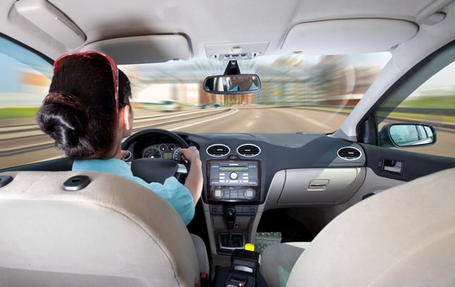 Woman driving car - from passenger perspective