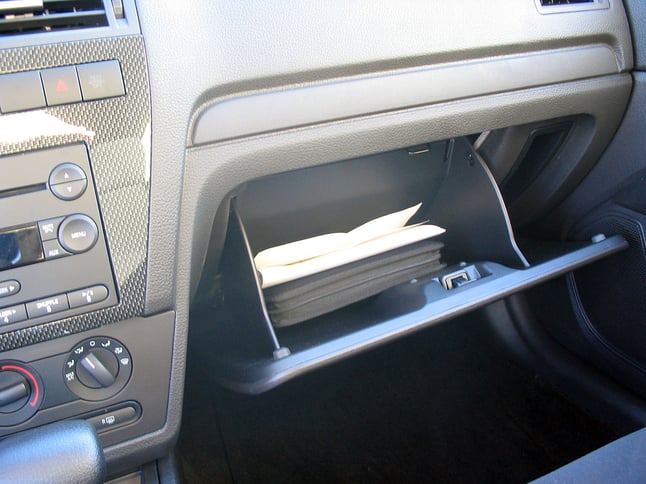 Is it OK to search a glove box in a warrantless auto search?