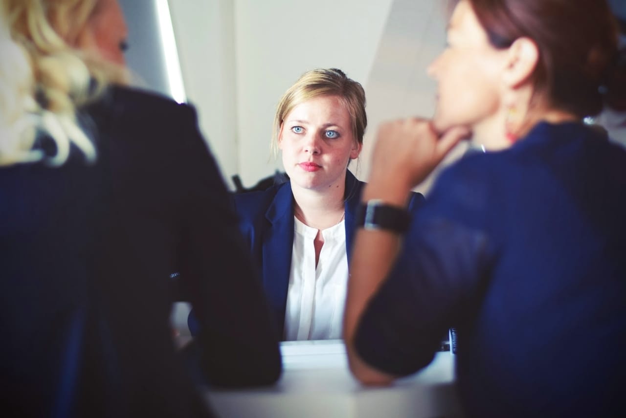 three-women-in-meeting