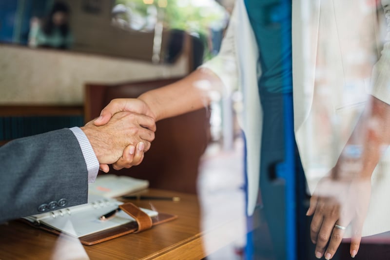 man-and-woman-shaking-hands