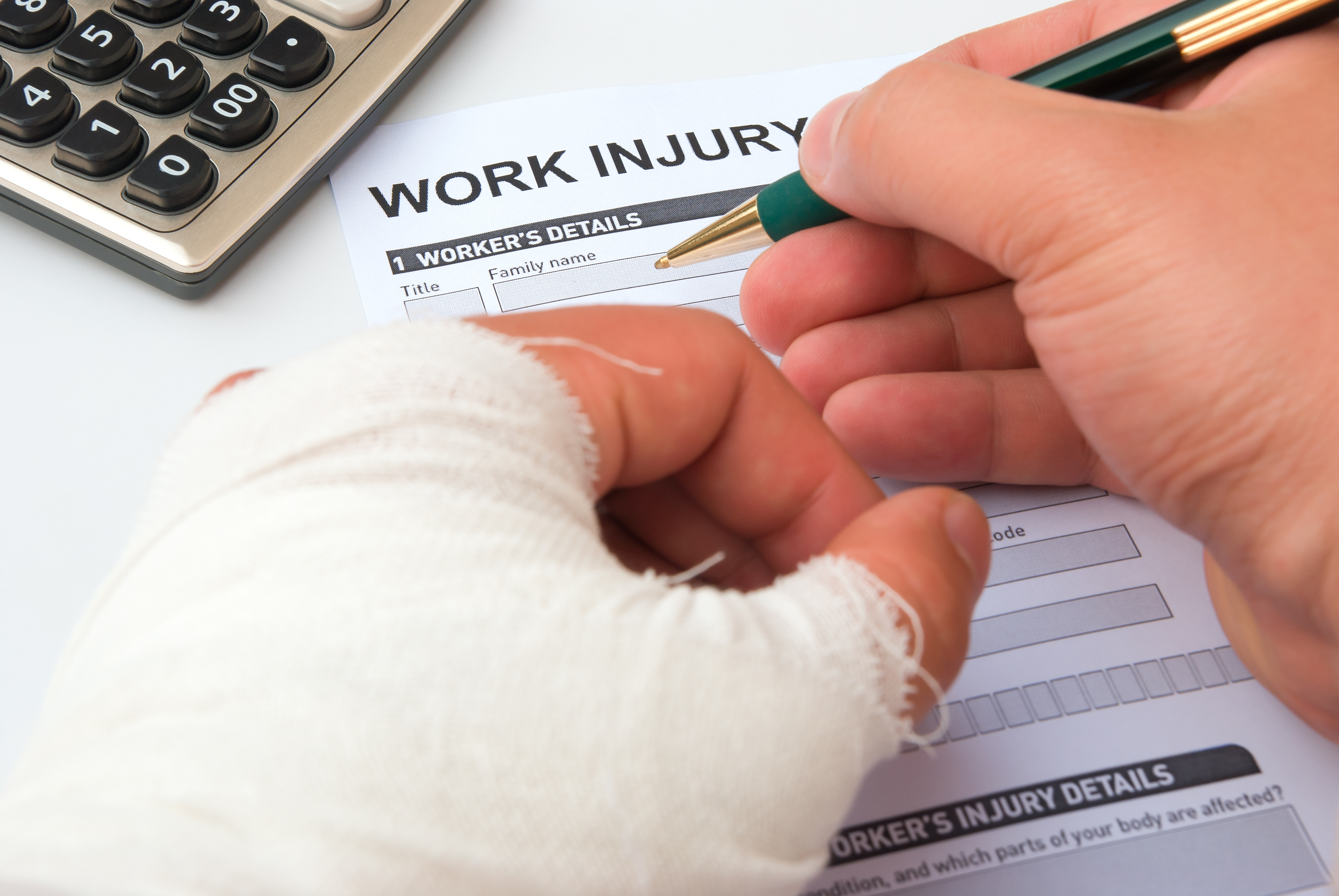 Injured employee filing workers compensation paperwork